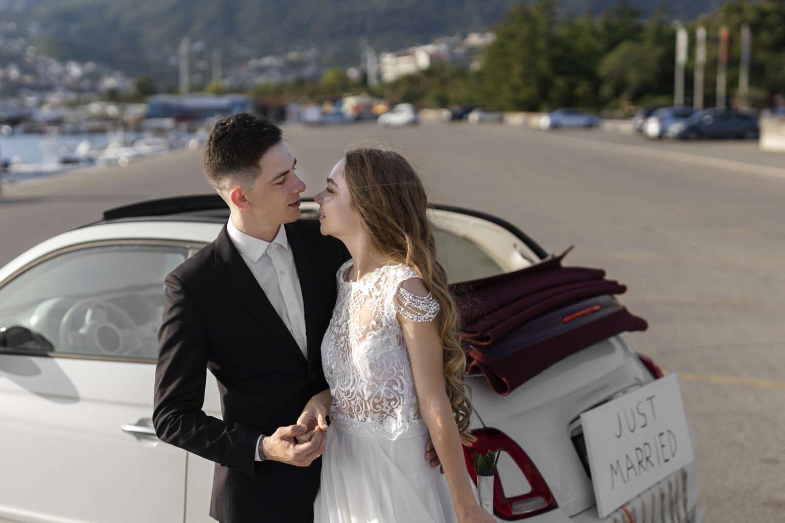 Couple Arriving at Their Melbourne Wedding Venue in a Luxury Vehicle